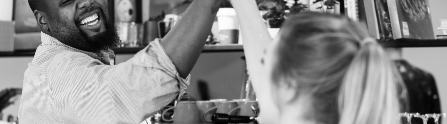 A clean pop-up stand with a branded gazebo, pull-up banners and a clear call-to-action